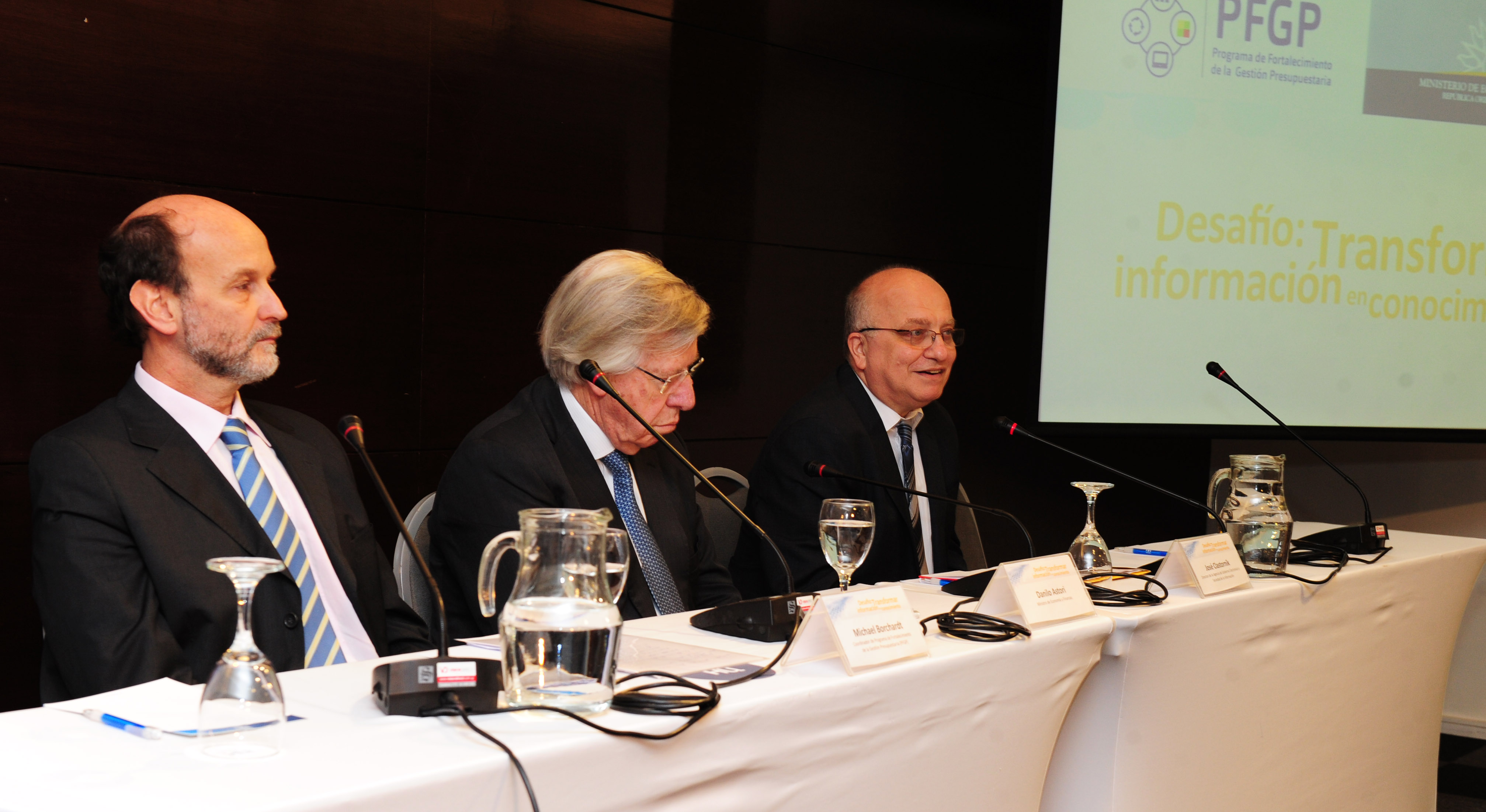 Coordinador del programa, Michael Borchardt, ministro de Economía y Finanzas, Danilo Astori y el director de AGESIC, José Clastornik
