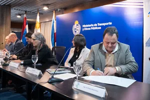 Firma de contrato entre CND y Serviam