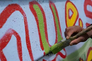 Más Barrio:pintada de mural en Cerro Norte